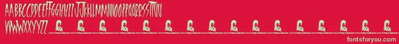 FreedomFighters-Schriftart – Grüne Schriften auf rotem Hintergrund