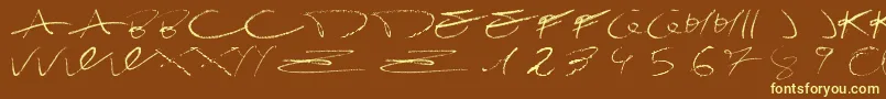 Czcionka DamagrafikscriptRegular – żółte czcionki na brązowym tle