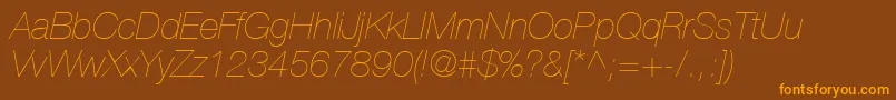 HelveticaLt26UltraLightItalic-Schriftart – Orangefarbene Schriften auf braunem Hintergrund