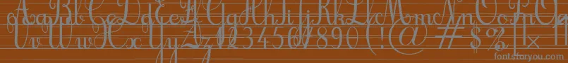 Шрифт Cursifl – серые шрифты на коричневом фоне
