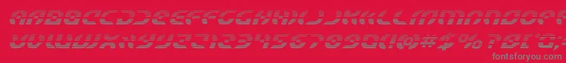 Starfighterboldgradital-fontti – harmaat kirjasimet punaisella taustalla