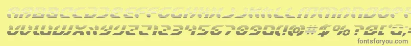 Starfighterboldgradital-fontti – harmaat kirjasimet keltaisella taustalla