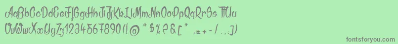 フォントAkodia – 緑の背景に灰色の文字