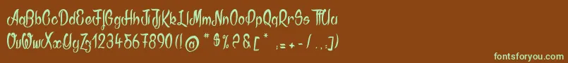 フォントAkodia – 緑色の文字が茶色の背景にあります。