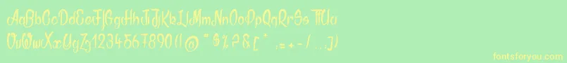 フォントAkodia – 黄色の文字が緑の背景にあります