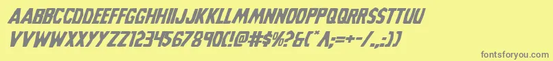 フォントGrimghostexpandital – 黄色の背景に灰色の文字