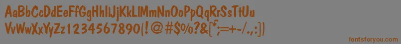 フォントPolitdbNormal – 茶色の文字が灰色の背景にあります。