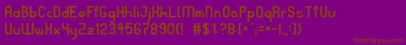TpfJanus Font – Brown Fonts on Purple Background