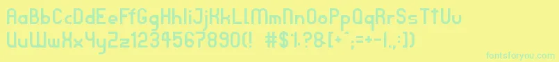TpfJanus Font – Green Fonts on Yellow Background