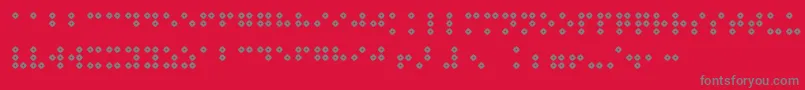 Шрифт Braillenumhollow – серые шрифты на красном фоне