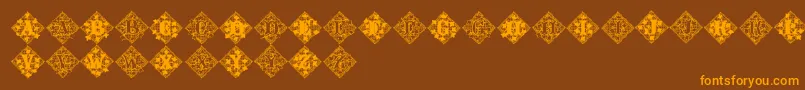 Jfivylac-Schriftart – Orangefarbene Schriften auf braunem Hintergrund