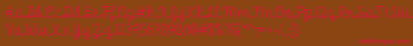 HelloHeartache Font – Red Fonts on Brown Background