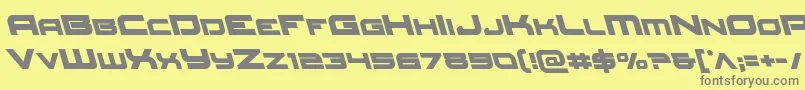 フォントRedrocketleft – 黄色の背景に灰色の文字