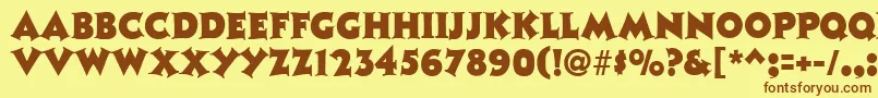 フォントTristanRegular – 茶色の文字が黄色の背景にあります。