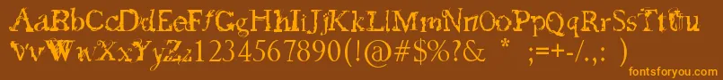 FeedMyFrankenstein-Schriftart – Orangefarbene Schriften auf braunem Hintergrund