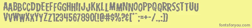 フォントCarnivalcorpsestagexpand – 黄色の背景に灰色の文字