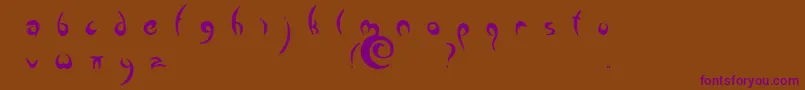 Greenman-fontti – violetit fontit ruskealla taustalla