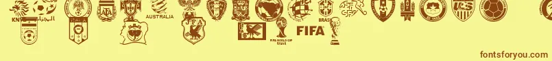 フォントWc2k14 – 茶色の文字が黄色の背景にあります。