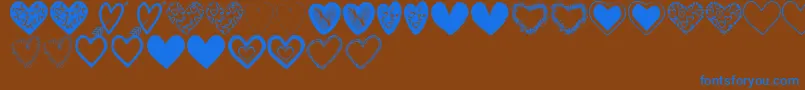 HeartsShapesTfb Font – Blue Fonts on Brown Background