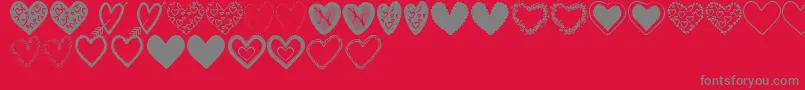HeartsShapesTfb Font – Gray Fonts on Red Background