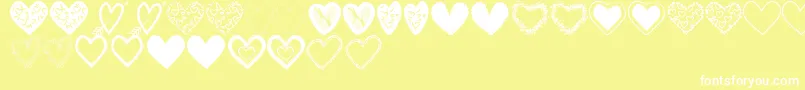 HeartsShapesTfb-Schriftart – Weiße Schriften auf gelbem Hintergrund