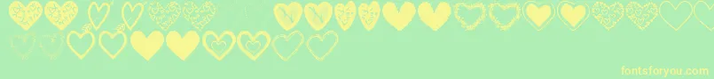 Weitere Informationen zur HeartsShapesTfb-Schriftart HeartsShapesTfb-Schriftart – Gelbe Schriften auf grünem Hintergrund