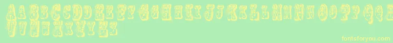 Vtksnoname Font – Yellow Fonts on Green Background