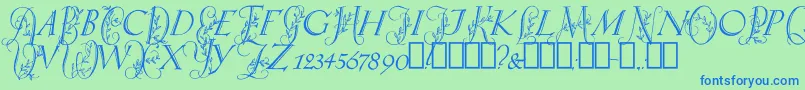 SpringtimeCapitals Font – Blue Fonts on Green Background