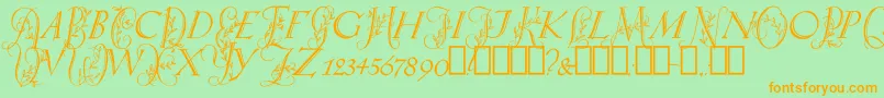 フォントSpringtimeCapitals – オレンジの文字が緑の背景にあります。