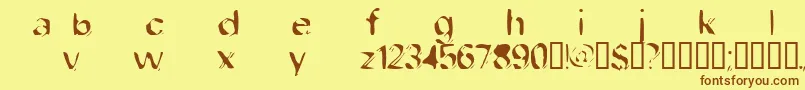 フォントDobfilet – 茶色の文字が黄色の背景にあります。