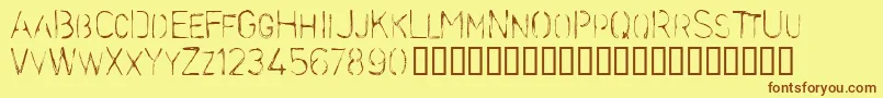 フォントStencilcase – 茶色の文字が黄色の背景にあります。