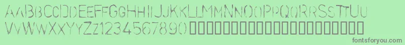 Stencilcase-Schriftart – Graue Schriften auf grünem Hintergrund