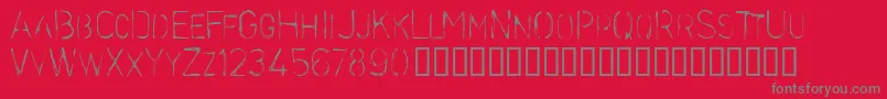 Fonte Stencilcase – fontes cinzas em um fundo vermelho