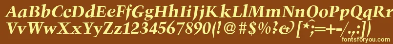 TroubadourBolditalic-fontti – keltaiset fontit ruskealla taustalla