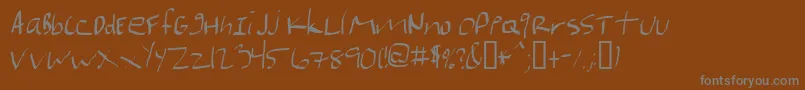 フォントMarianfudge – 茶色の背景に灰色の文字