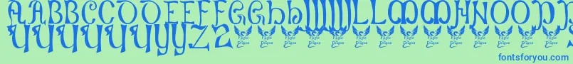 Battelabbey Font – Blue Fonts on Green Background