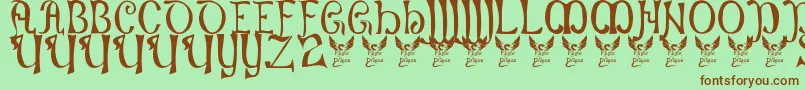 Battelabbey Font – Brown Fonts on Green Background