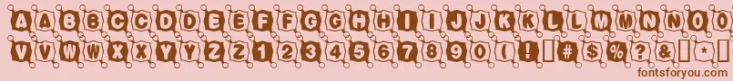 Balltack-Schriftart – Braune Schriften auf rosa Hintergrund