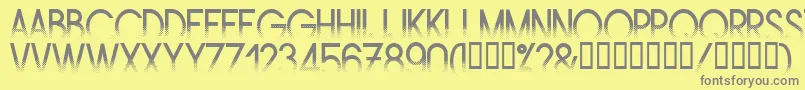 Amstrg-fontti – harmaat kirjasimet keltaisella taustalla