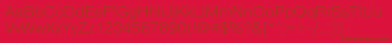 PragmaticaExtralightReg-Schriftart – Braune Schriften auf rotem Hintergrund