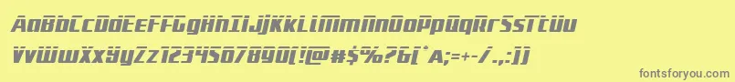 フォントSubadailaserital – 黄色の背景に灰色の文字