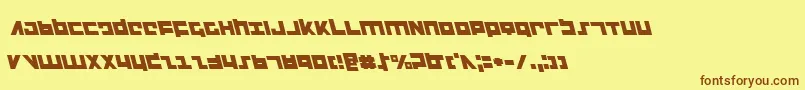 フォントFlightcorpsl – 茶色の文字が黄色の背景にあります。