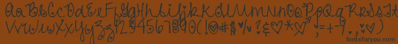 Шрифт DjbHeartAttack – чёрные шрифты на коричневом фоне