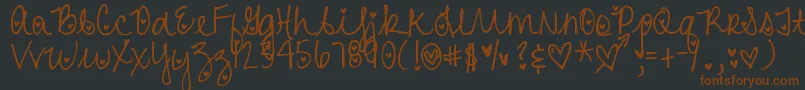 DjbHeartAttack Font – Brown Fonts on Black Background