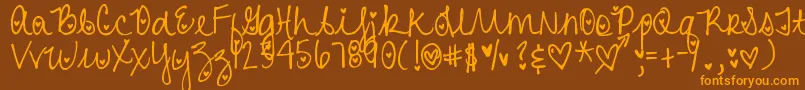 DjbHeartAttack-Schriftart – Orangefarbene Schriften auf braunem Hintergrund