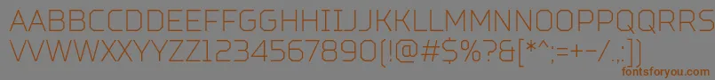 TtSquaresCondensedThinDemo Font – Brown Fonts on Gray Background