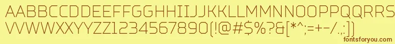 TtSquaresCondensedThinDemo Font – Brown Fonts on Yellow Background