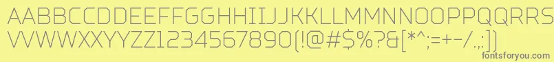 フォントTtSquaresCondensedThinDemo – 黄色の背景に灰色の文字