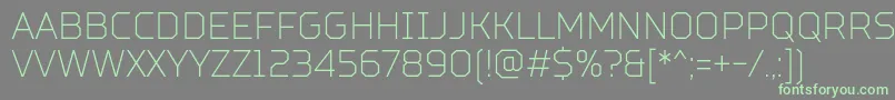 TtSquaresCondensedThinDemo Font – Green Fonts on Gray Background