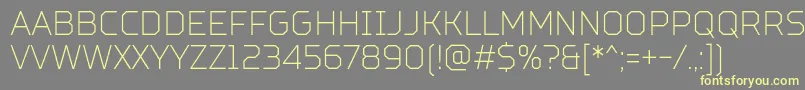 TtSquaresCondensedThinDemo Font – Yellow Fonts on Gray Background